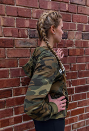 Woman wearing Camo Crop Hoodie back view