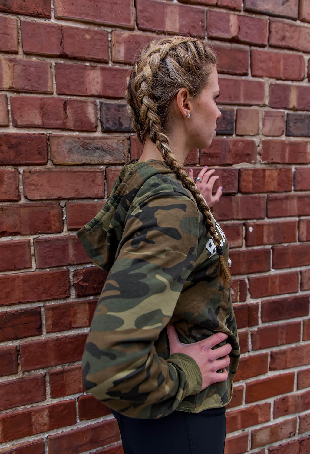 Woman wearing Camo Crop Hoodie back view