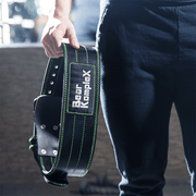 Man holding belt after work out