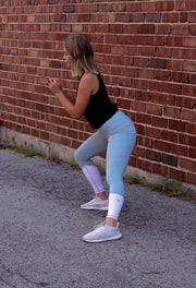 Woman wearing BKX Frosted Teal/White Leggings