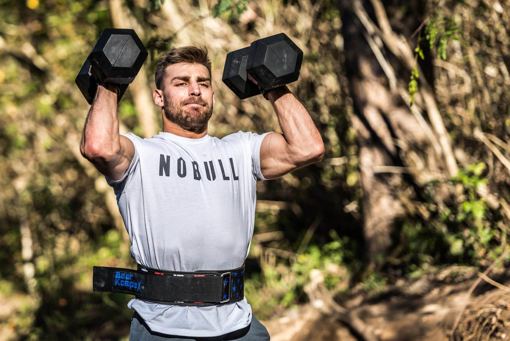 man lifting heavy weights outdoors wearing BKX - STRAIGHT 4" Belt Stars and Stripes