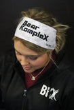 Woman wearing BK JUNK Delta Force Headband Showing top of head with logo