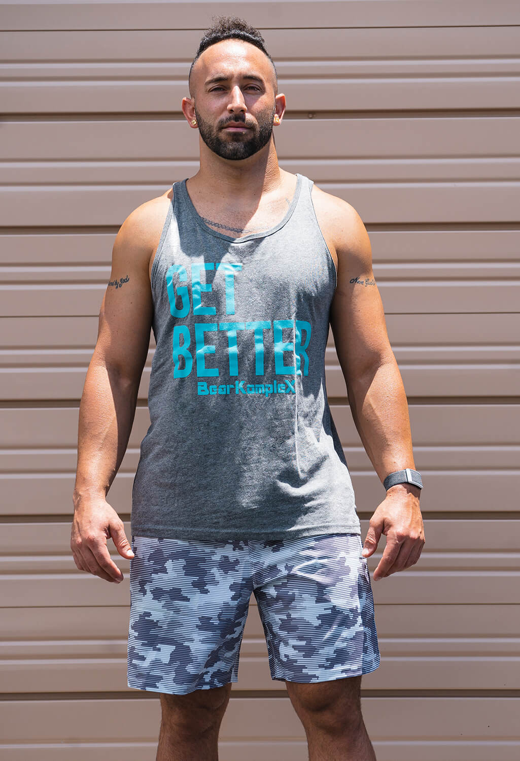 Man wearing Get Better Men's Tank