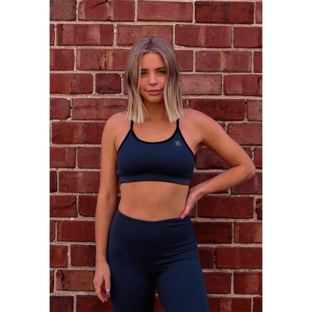 Woman wearing Bear KompleX Reversible Bra Front view