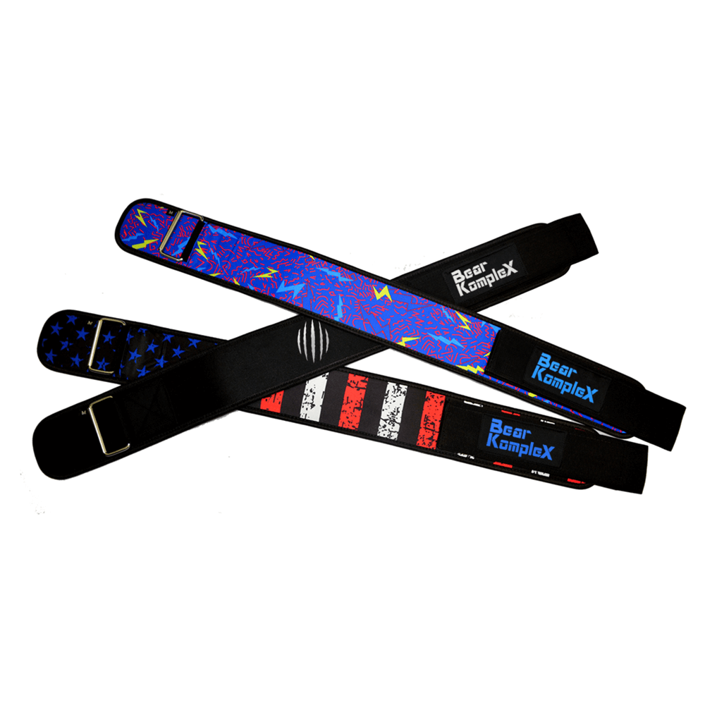 Black belt crossing over lightning belt and stars and stripes belt