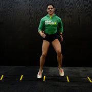 woman using BKX Agility Ladder indoors