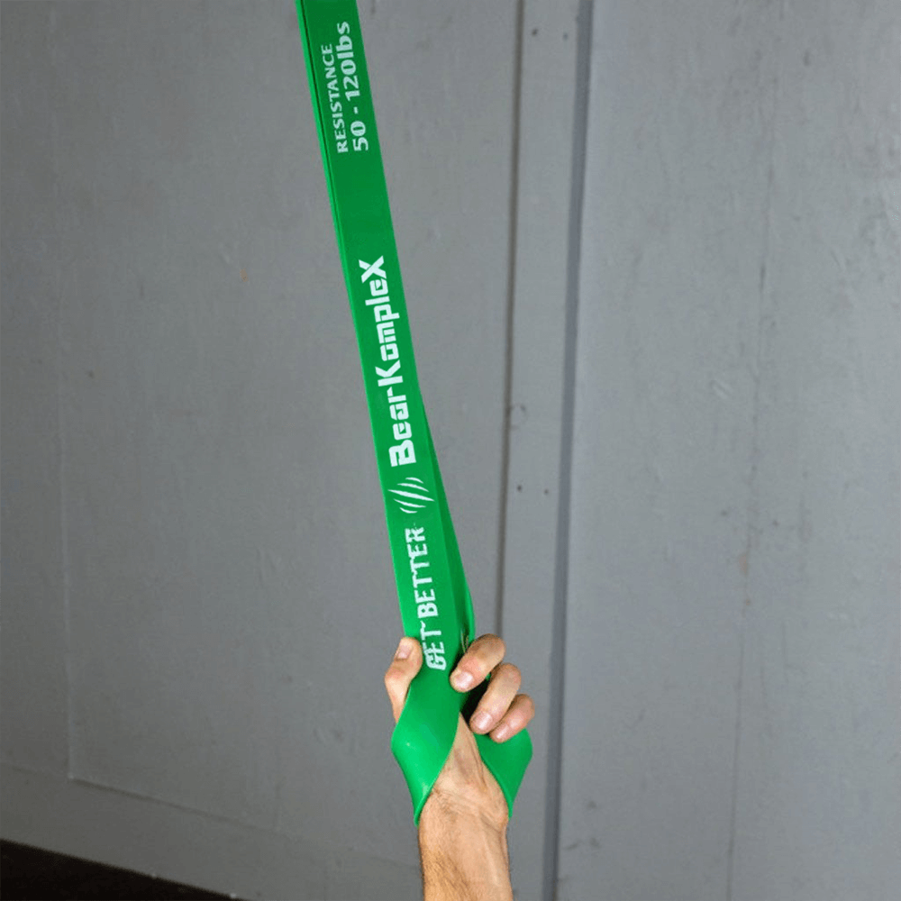 Working out with green resistance band