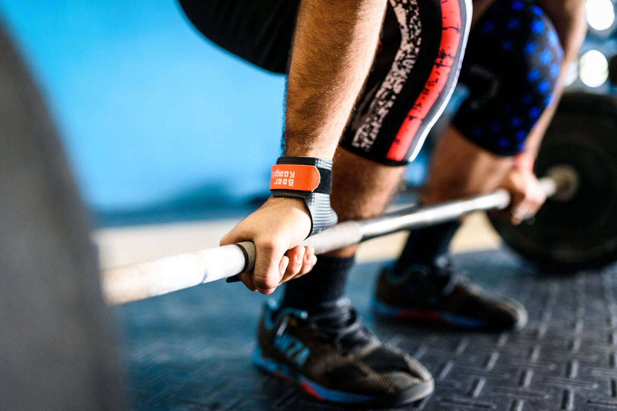 man lifteing wearing Bear KompleX Knee Sleeves - Stars and stripe sleeve