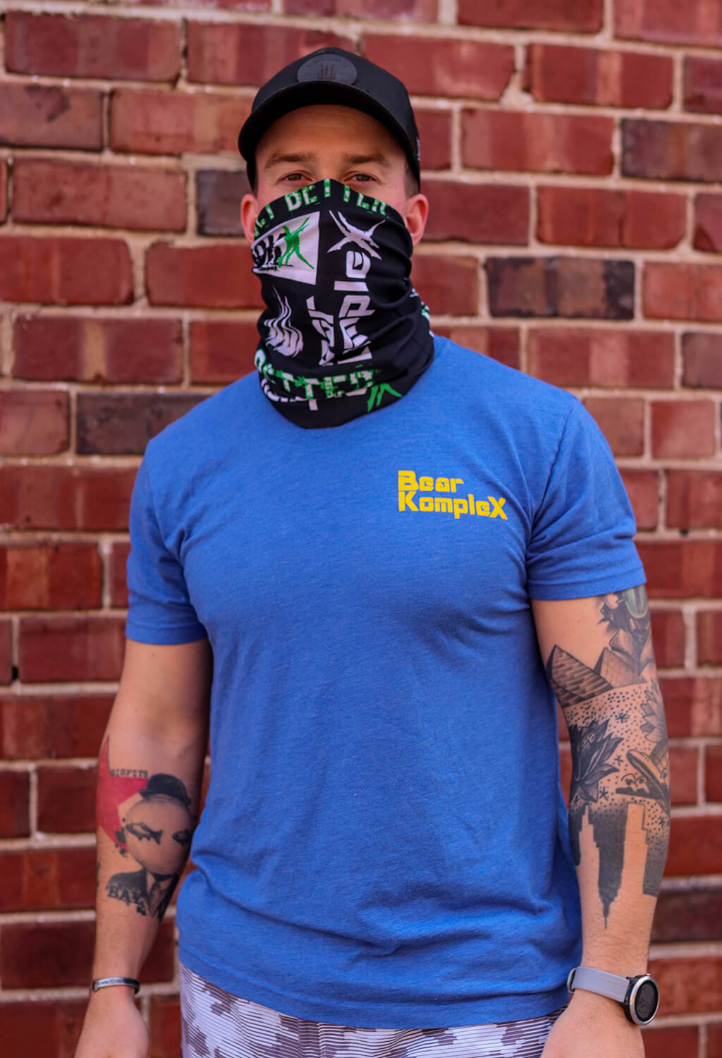 man wearing BKX Neck Gaiter and blue bear komplex shirt