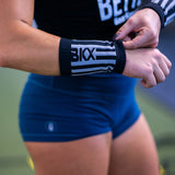 putting on BKX Wristbands before working out
