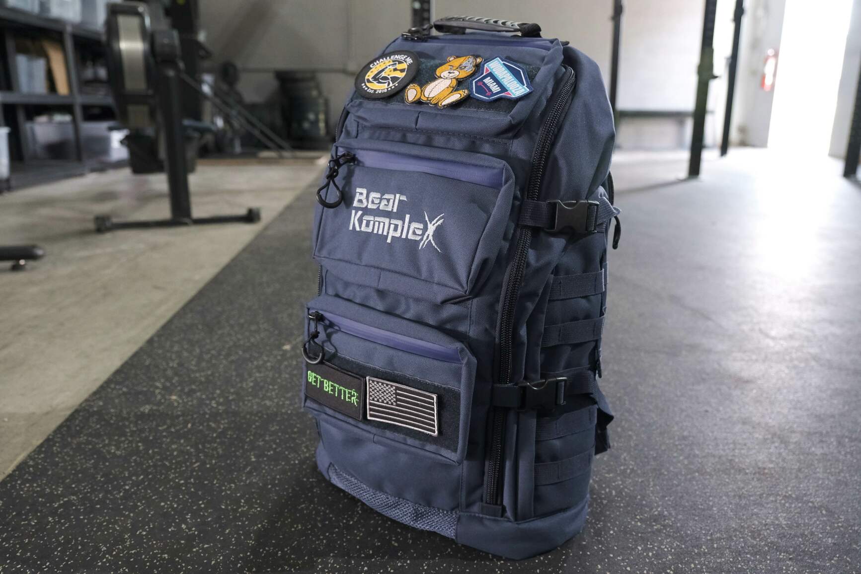 Navy backpack close up showing front angled view 