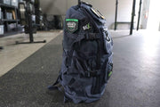 Navy backpack close up showing side view 