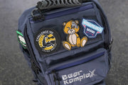 Navy backpack close up showing top view 