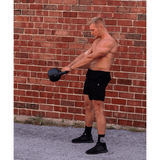 Working out with kettlebell and wearing Black Casual Shorts