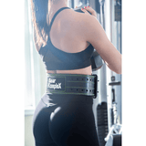 Woman lifting weight and wearing Bear Komplex lifting belt