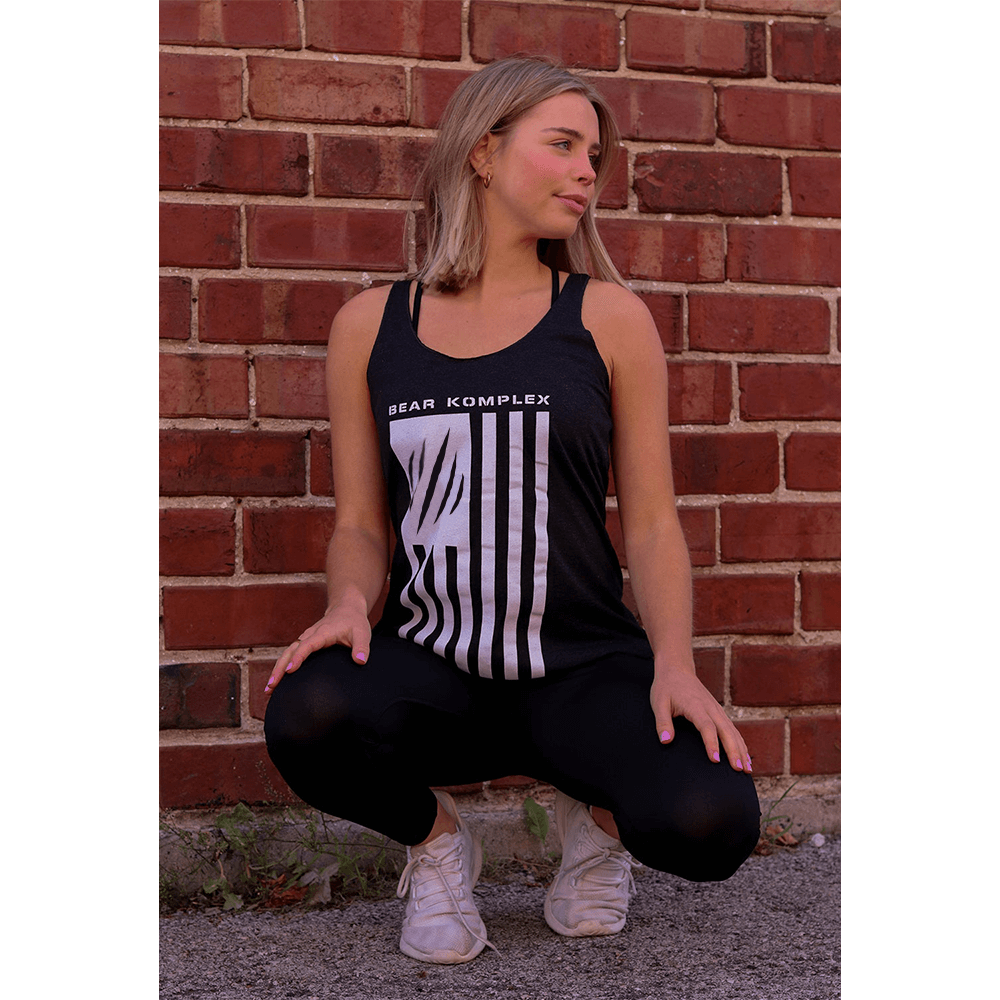 woman wearing BKX Patriot Series Tank - Black/White with a brick background