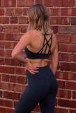 Woman wearing Bear KompleX Reversible Bra side/back view
