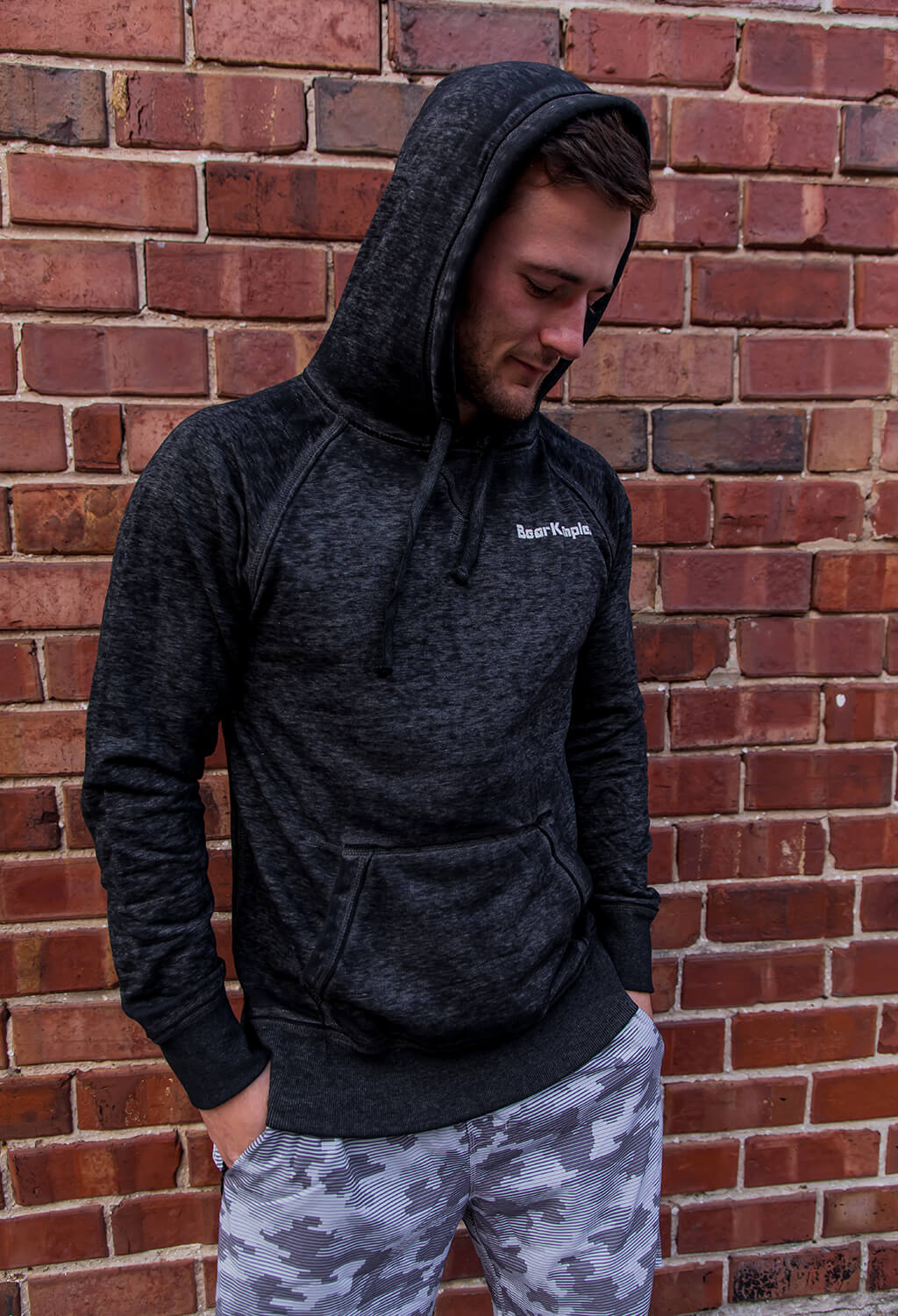 Black Zen Hoodie man with hood on